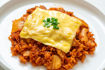 kimchi fried rice with pork and topped cheese