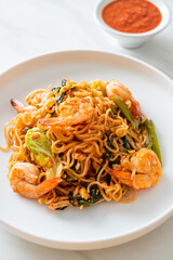 Stir-fried instant noodles sukiyaki with shrimps