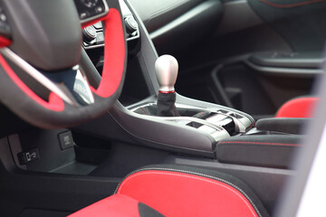 Close up view of a manual gear lever shift isolated. Manual gearbox. Car interior details. Car transmission.