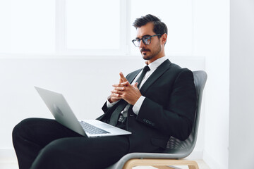 Man winner laptop chair technology positive office business happy businessman job