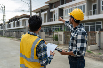 Engineer team discussing and working at outdoor construction site Inspect locations, paths,...
