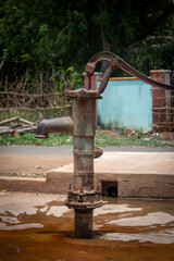 Old fashioned hand pump used for pumping water found in village area