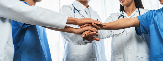 Group of medical staff doctor nurse and healthcare specialist profession coordinating synergy hand...