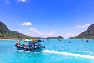Fototapeta na wymiar Ben Dam port under a sunny day, Con Dao island, Vietnam
