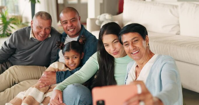 Big family, funny and selfie in home living room, bonding and relax together on floor. Children, parents and grandparents with profile picture, laughing and happy memory for social media in house