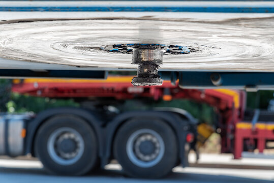 King pin, part of the trailer that engages with the truck bed or fifth wheel for towing.
