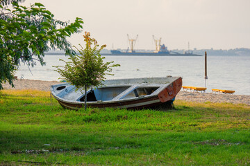 abandoned fisherman boat on beach