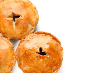 Tasty meat pot pies on white background