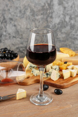 Glass of red wine on table