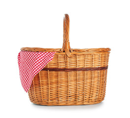 Wicker picnic basket with napkin isolated on white background