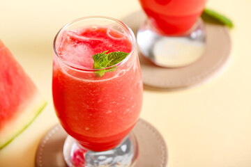 Glass of tasty watermelon fresh on yellow background