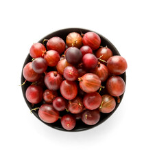 Bowl with fresh gooseberries on white background