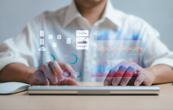 Data analyst working on dashboard with chart virtual screen. concept of presenting data to analyze performance or Key Performance Indicators (KPI) to report on performance of business organizations