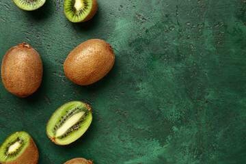 Fresh kiwi on green background