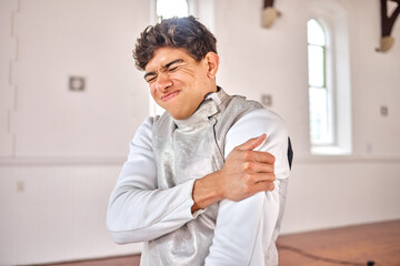 Fencing, man and shoulder pain, injury or accident after training, exercise or workout in club....