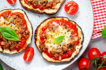 Eggplant Pizza with Tomato Sauce, Minced Meat, Mozzarella and Basil, Mini Vegetable Pizza over Bright Background