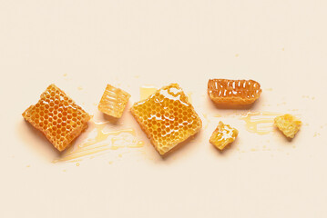 Sweet honeycombs on yellow background