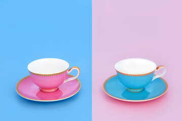  Tea for two with porcelain tea cups. Elegant luxury drinking duality reflection concept set on pastel baby blue and pink background. Minimal zen composition.