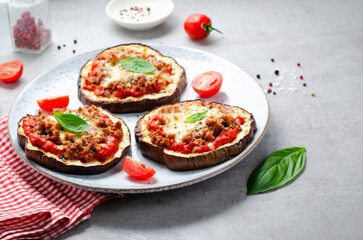 Eggplant Pizza with Tomato Sauce, Minced Meat, Mozzarella and Basil, Mini Vegetable Pizza over Bright Background