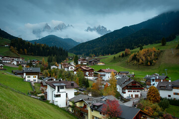 Fototapeta na wymiar Picturesque Village of Val di Funes with the dolomite rocky mountains in Italy at night