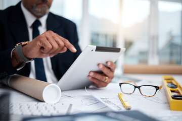 Tablet, hands and architect with research at desk for typing, architecture or planning on internet. Technology, fingers of man and engineer writing, construction design and email for online blueprint