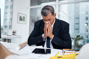 Sick, professional and architect man in an office with tissue for blowing nose at desk. Mature male engineer person frustrated with flu virus, allergies or health problem in construction industry