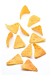 a pile of nachos or  tortilla chips on a white background