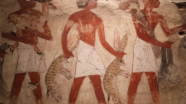 Ancient Egyptian Painting Depicting Servants Carrying Hunted Hares (Nebamun)