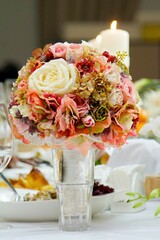 Bright wedding bouquet for the ceremony from fresh flowers