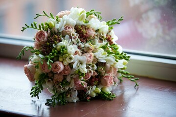 Bright wedding bouquet for the ceremony from fresh flowers