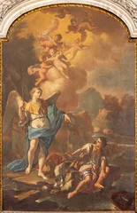 Tuinposter NAPLES, ITALY - APRIL 22, 2023:The painting of archangel Raphael with the Tobias  in the church Basilica di San Pietro ad Aram by Giacinto Diano (1763). © Renáta Sedmáková