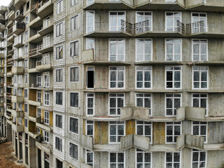 Fototapeta na wymiar construction of a multi-storey residential building in the city. close up view. High quality photo