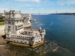 Tower of Belem Lisboa. Tagus river. Aerial drone view. Flying over. High quality photo