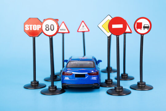driving school Background, driving exam preparation, traffic safety, car and road signs on a blue background