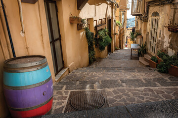 Colorful Narrow street with stairs of the old town of Agrigento, Sicily, Italy