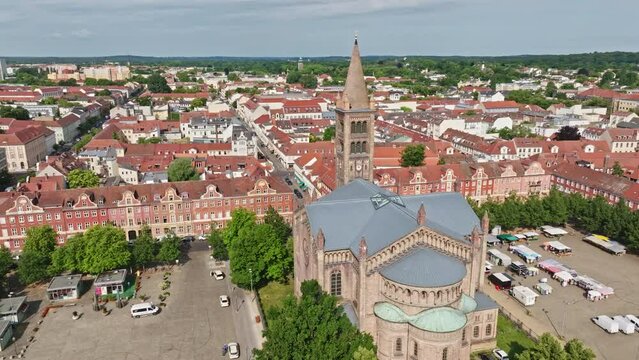 Aerial Drone shot of Catholic Parish Church of St. Peter and Paul ( Katholische Pfarrkirche St. Peter und Paul ) in Potsdam , Germany