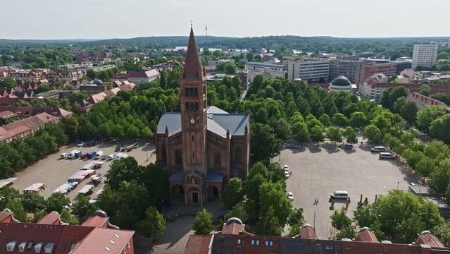 Aerial Drone shot of Catholic Parish Church of St. Peter and Paul ( Katholische Pfarrkirche St. Peter und Paul ) in Potsdam , Germany
