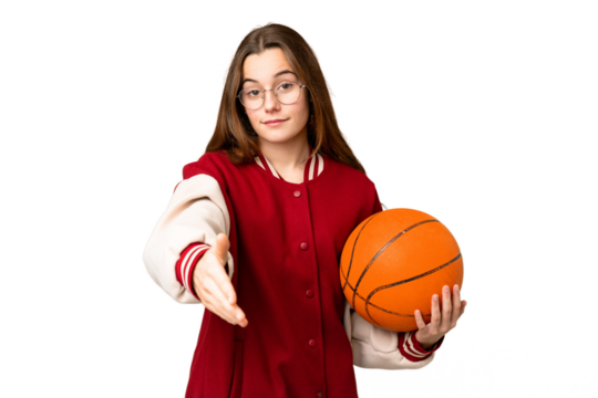 Teenager girl playing basketball over isolated chroma key background shaking hands for closing a good deal