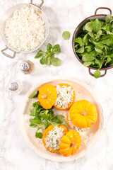 Baked stuffed pumpkin with rice and salad