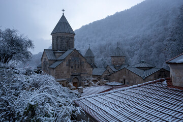 Armenia, Hagartsin monastery (13-th century) at Dilijan natural park, november first snow