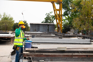 Take a break from hard work. Tired hot wiping sweat. Construction worker man people drinking water...
