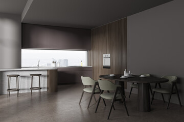 Gray and wooden kitchen corner with bar and table