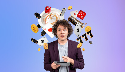 Surprised man with tablet in hand and opened mouth, casino jackpot icons