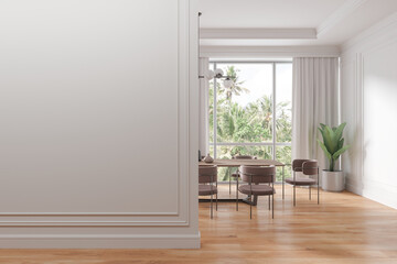 White dining room interior with blank wall
