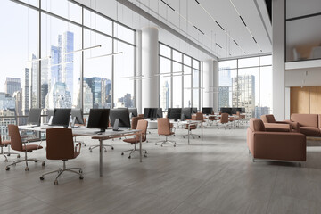 Modern coworking interior with pc computer on desk and soft place