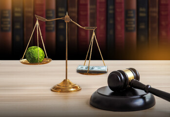 International Law and Environment Law. Green World and gavel with scales of justice and books.