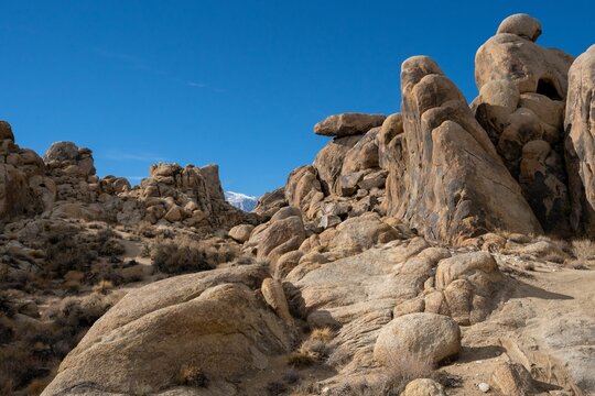 Close-up shot of rocky stones with a vibrant blue sky backdrop