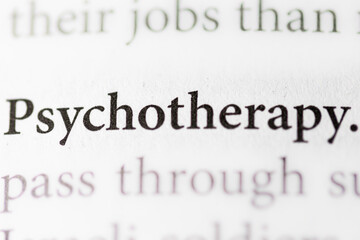 close-up of the term Psychotherapy on paper background