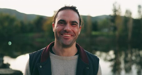 Man face, camping and happy outdoor in nature, woods and relax in the environment with happiness, peace or calm mindset. Portrait, smile and wellness in the morning on vacation, holiday or adventure