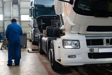 Trucks repair in car service.